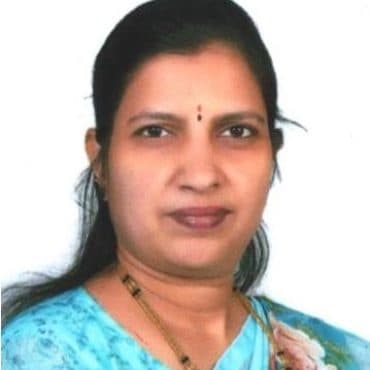 Portrait of SMT. UMA VAGEESH, Director at DHUSBN