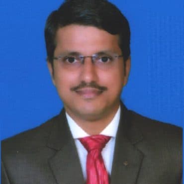 Portrait of SRI. KIRAN R SHETTY, Prof. Director at DHUSBN