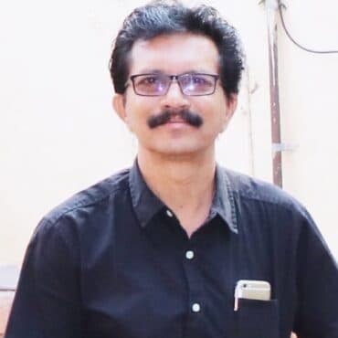 Portrait of SRI. KOTRESH A, Director at DHUSBN